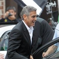 George Clooney on the set of a Mercedes Benz E300 L advert photos | Picture 78317